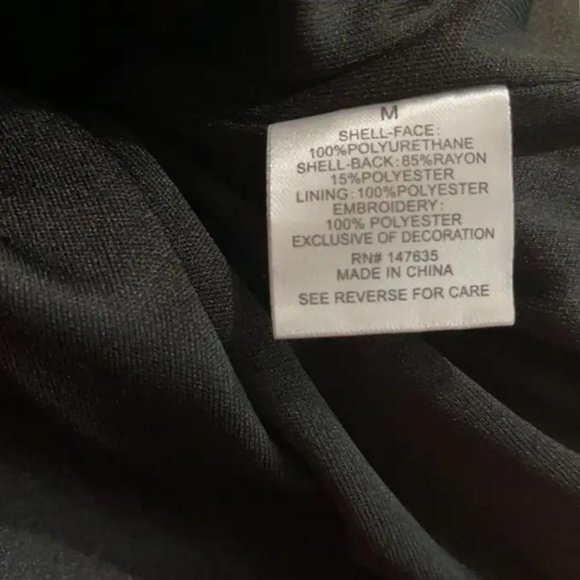 Romeo & Juliet Couture Embroidered faux-leather studded mini skirt. - Picture 7 of 7